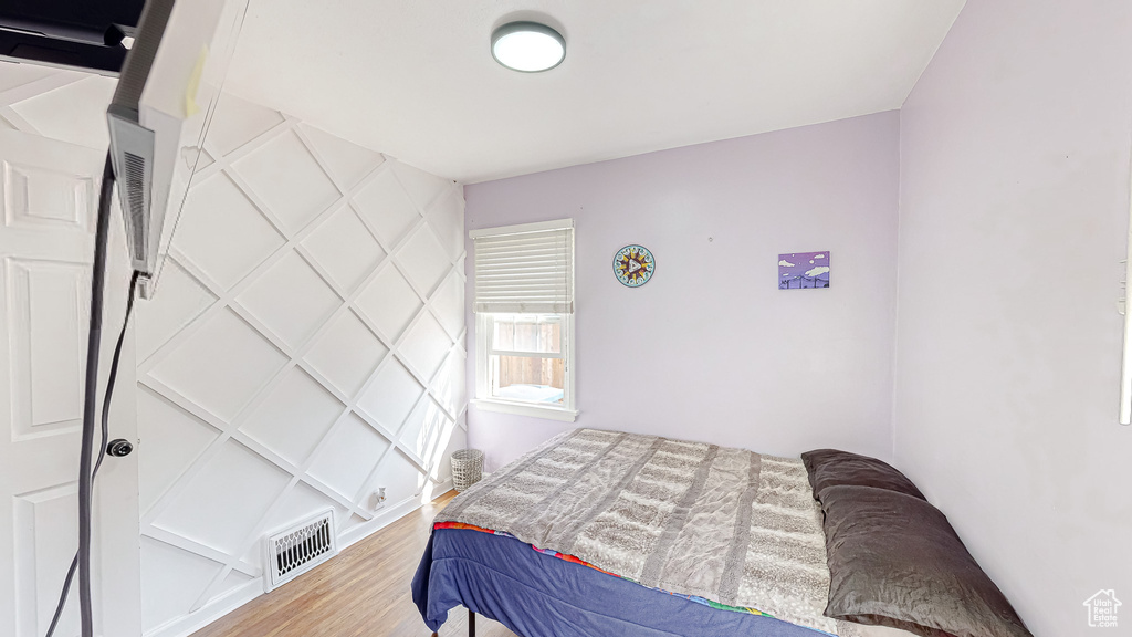 Bedroom featuring hardwood / wood-style floors