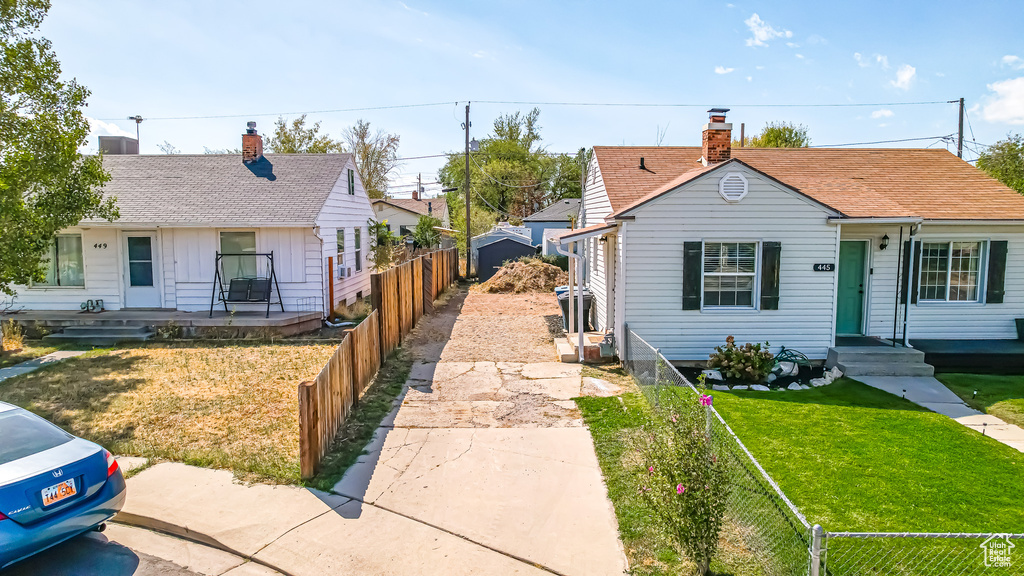 Bungalow with a front lawn