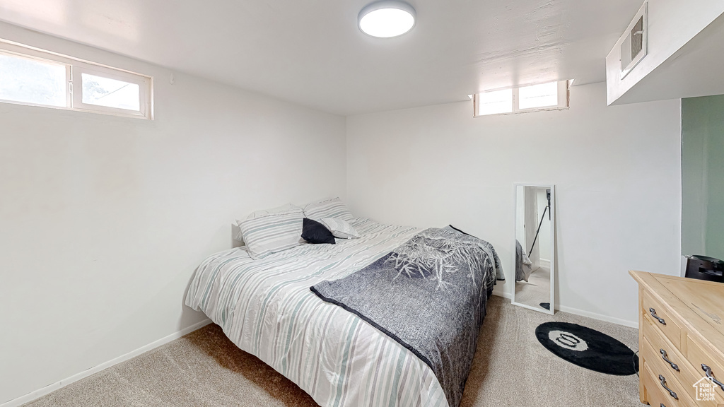 View of carpeted bedroom