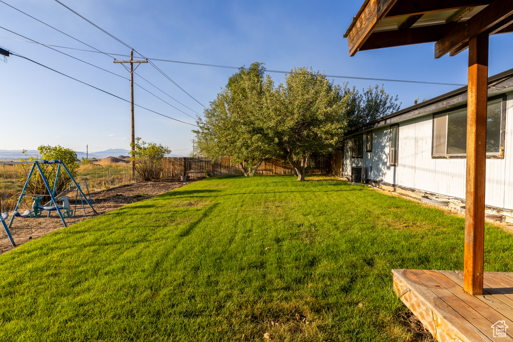 View of yard with central air condition unit