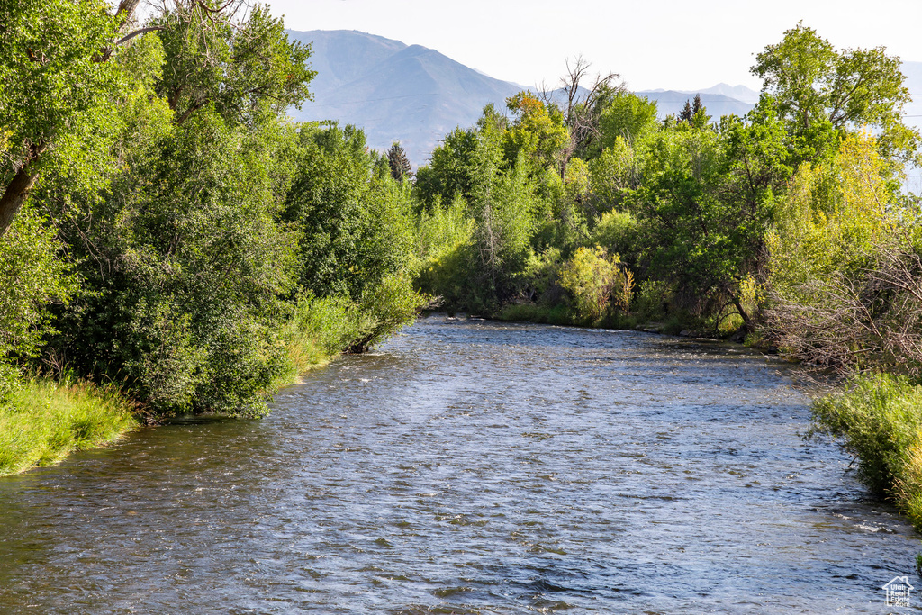 Property view of water with a mountain view