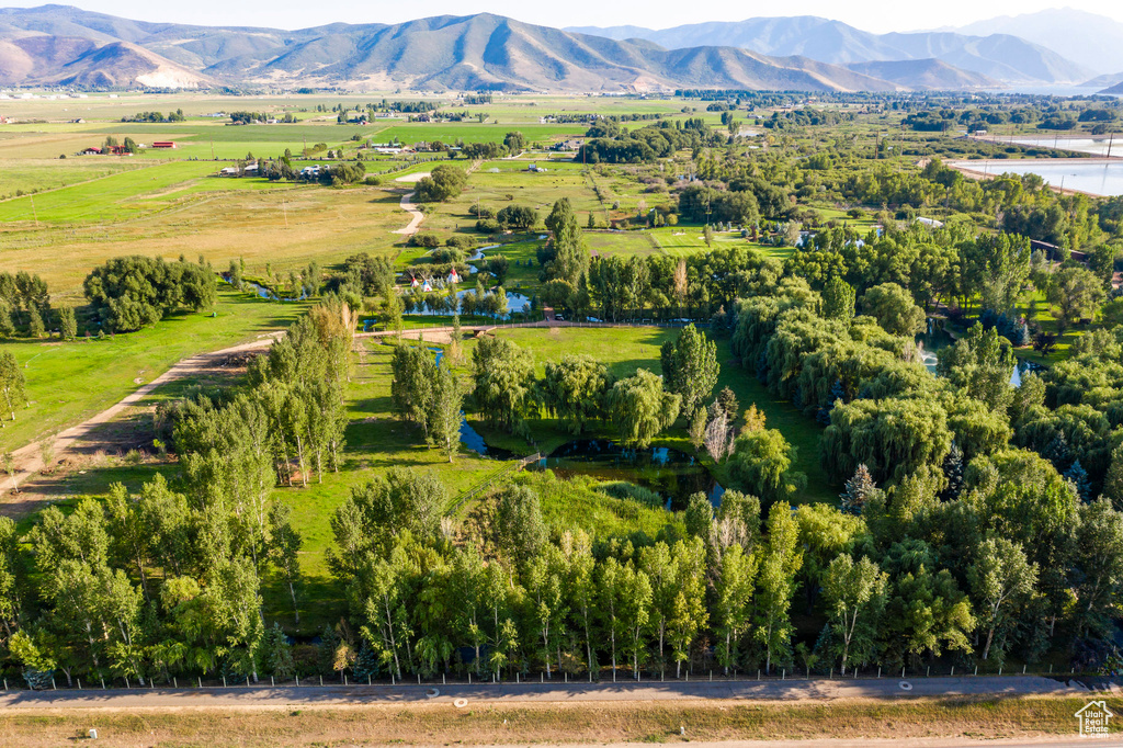 Birds eye view of property featuring a rural view and a mountain view