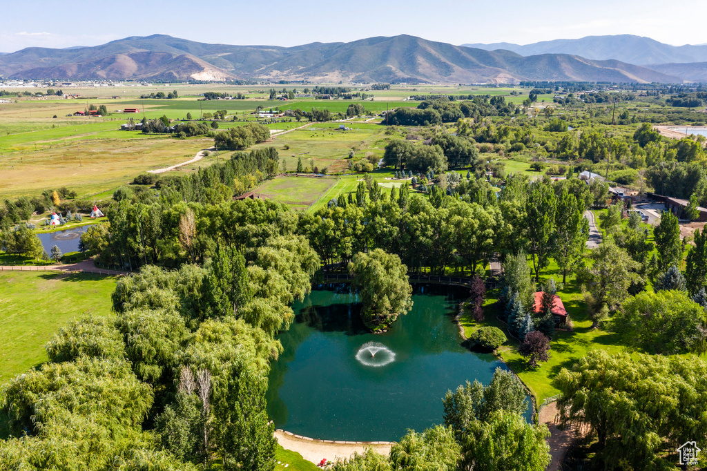 Bird's eye view with a rural view and a water and mountain view