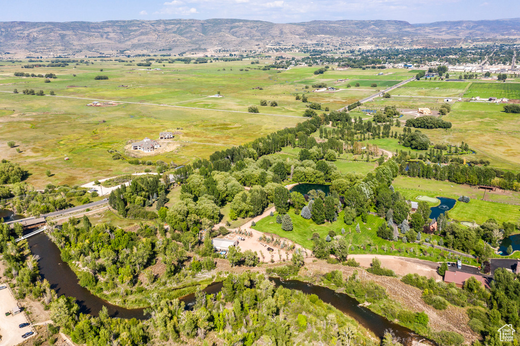 Bird's eye view featuring a water and mountain view and a rural view