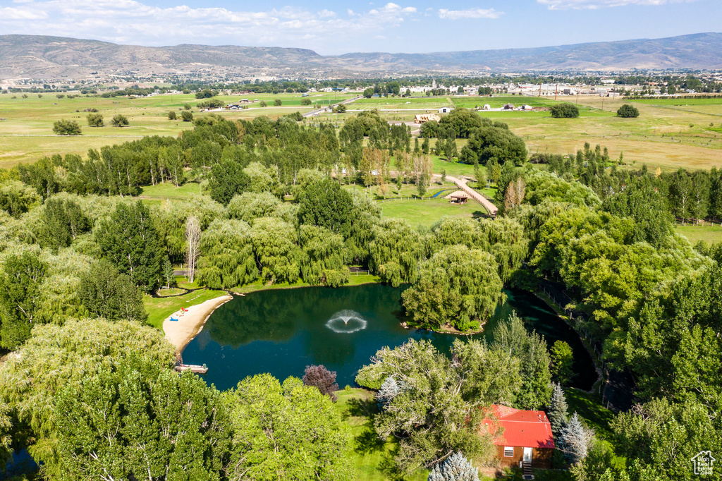 Bird's eye view featuring a rural view and a water and mountain view