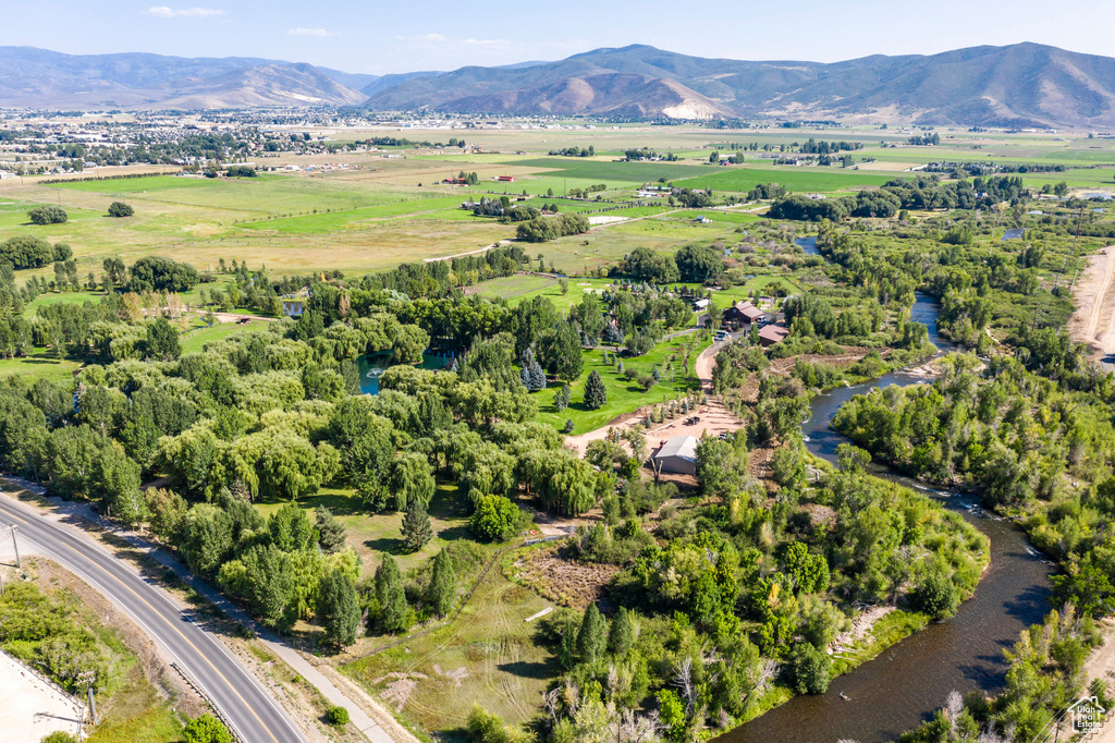 Birds eye view of property featuring a mountain view and a rural view