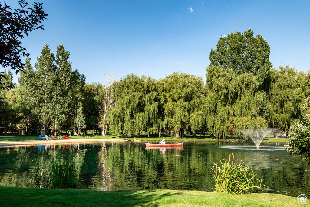 View of community with a water view