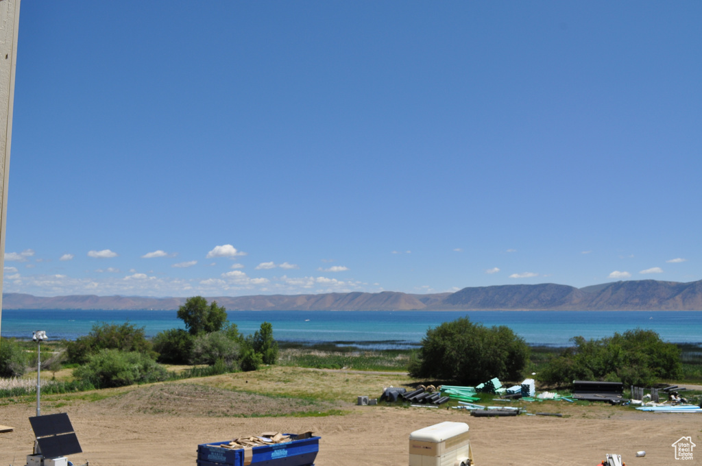 Mountain view featuring a water view