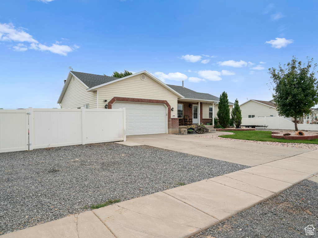 Single story home with a garage