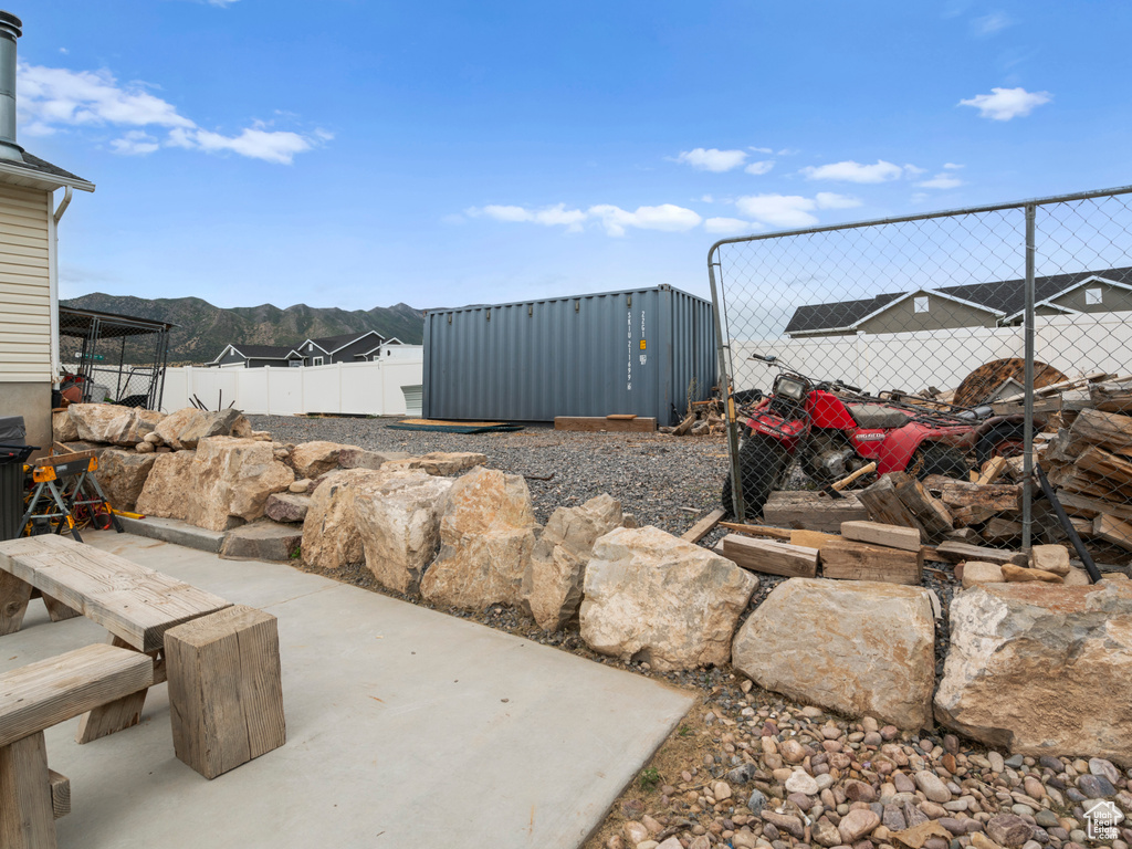 View of patio with a mountain view