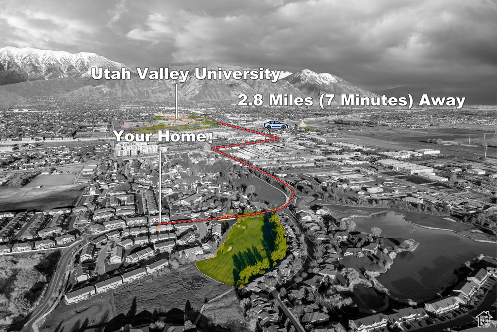 Birds eye view of property featuring a mountain view