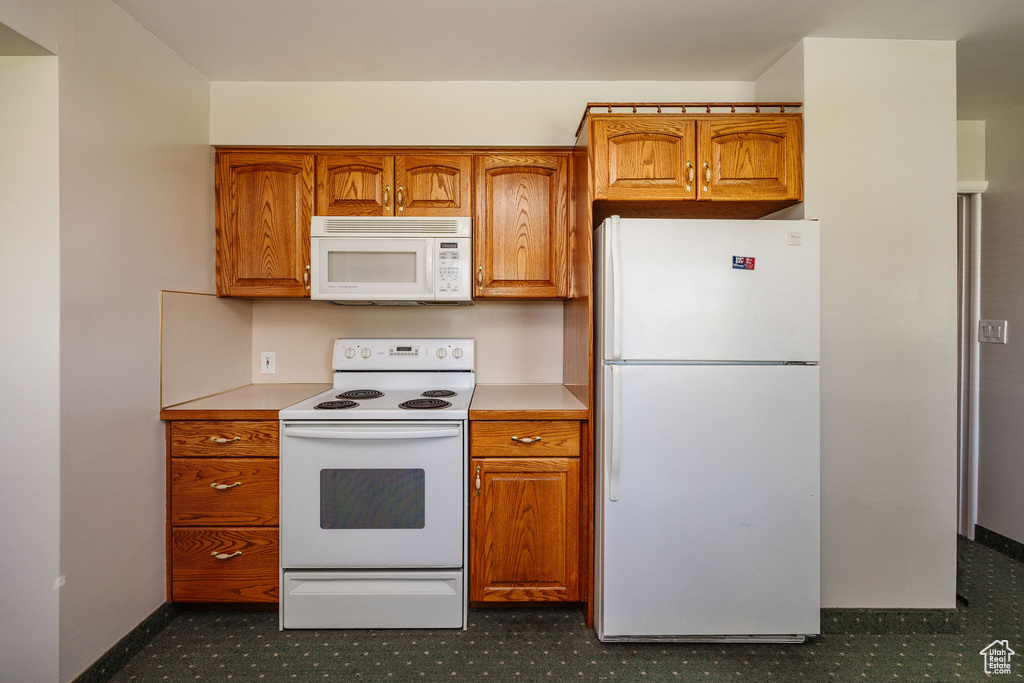 Kitchen with white appliances