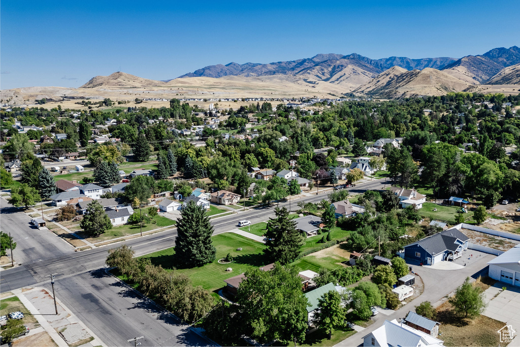 Birds eye view of property featuring a mountain view