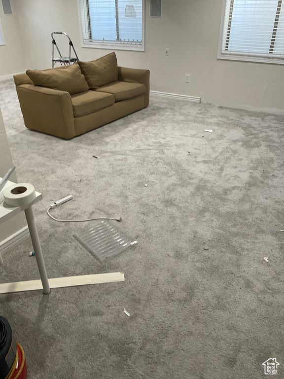 Unfurnished living room with carpet flooring