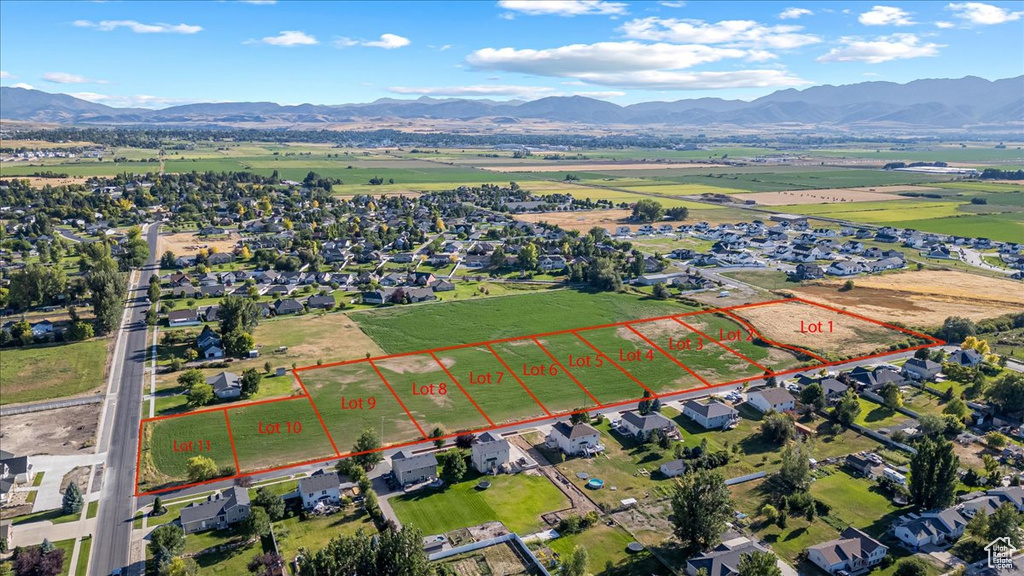 Drone / aerial view featuring a mountain view and a rural view