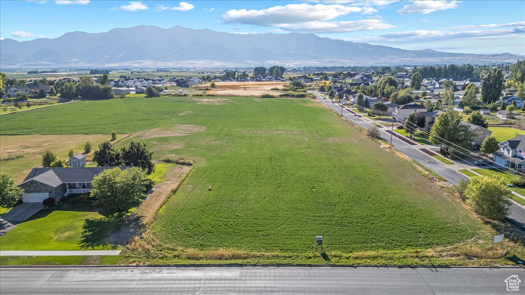 Drone / aerial view featuring a mountain view and a rural view