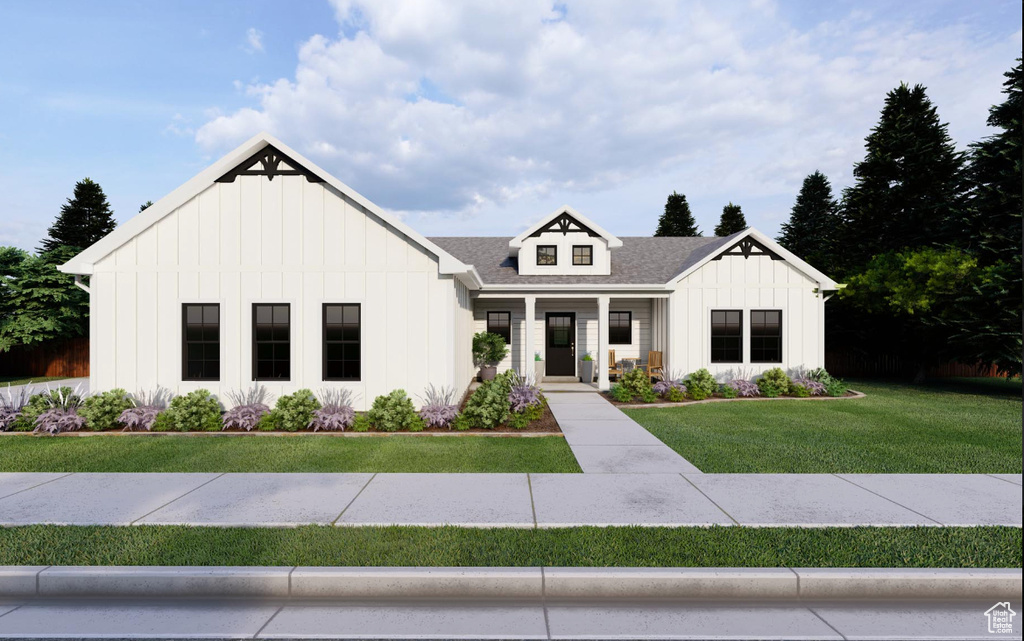 Modern farmhouse with a front lawn