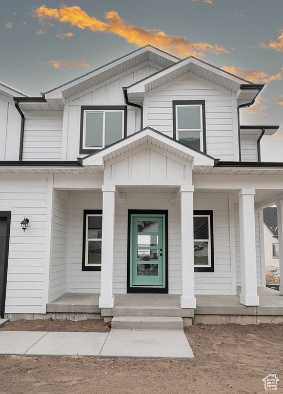 View of front of house featuring covered porch