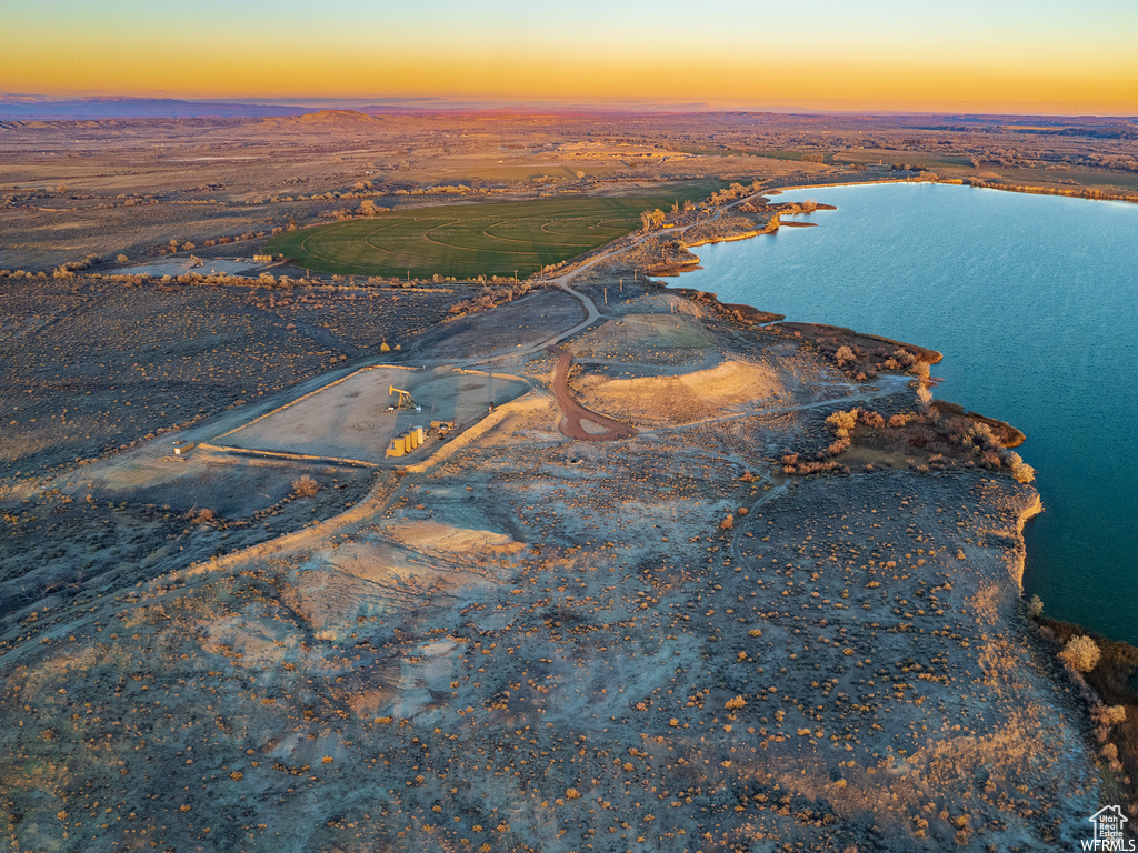 Aerial view at dusk with a water view