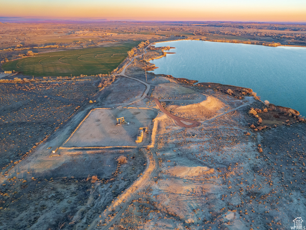 Aerial view at dusk with a water view