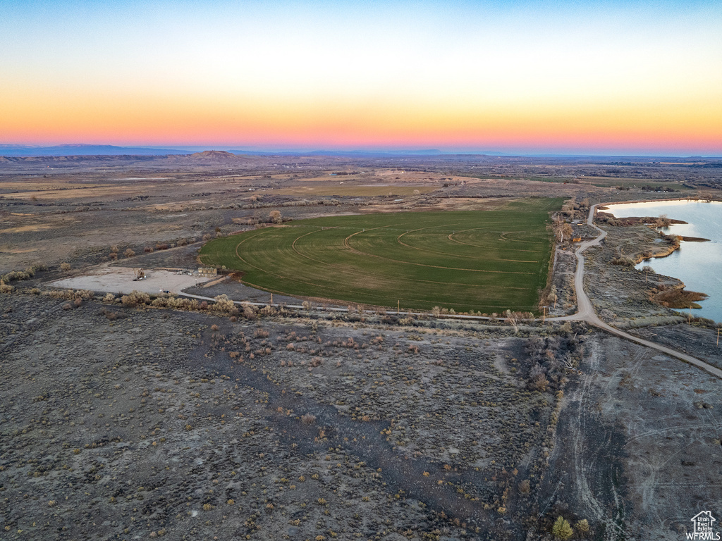 Aerial view at dusk with a water view