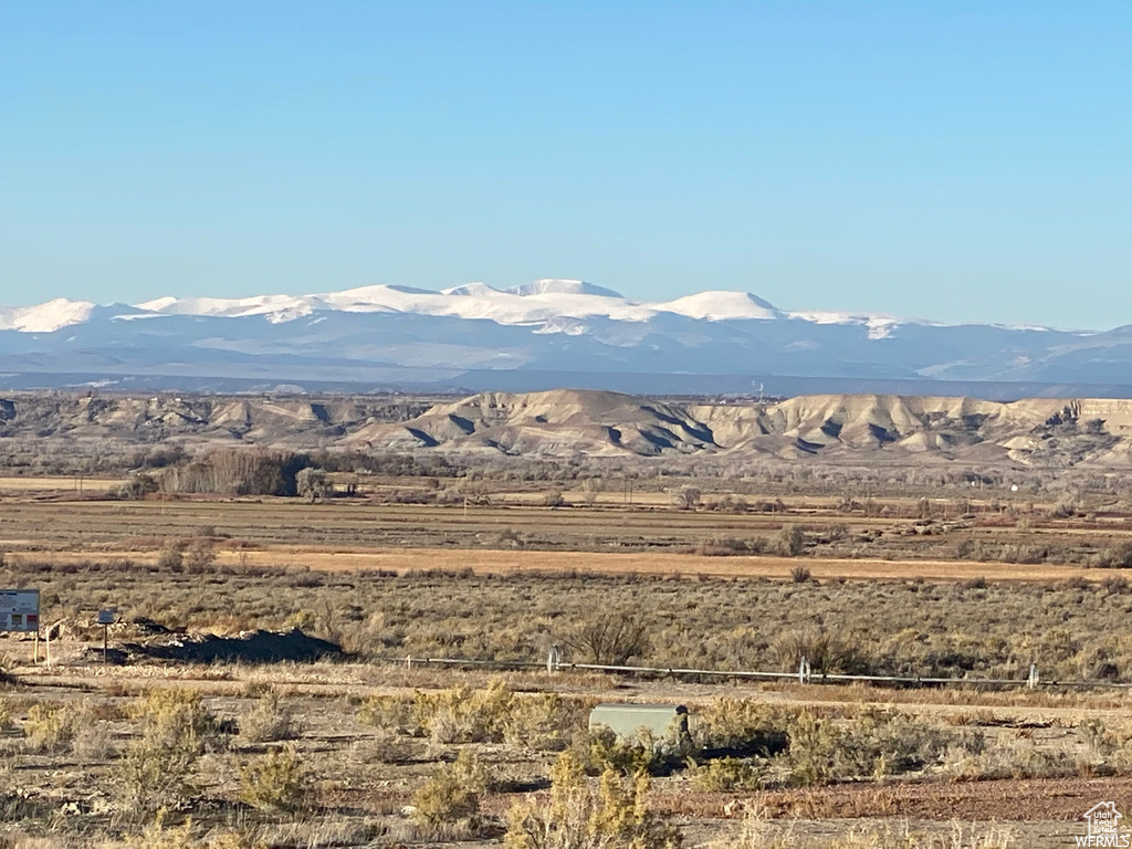 View of mountain feature with a rural view