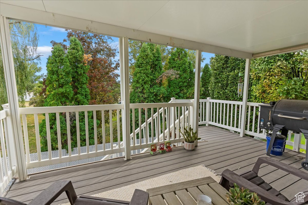 Wooden terrace with area for grilling