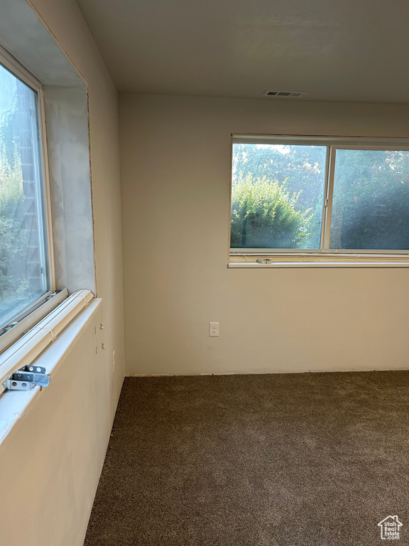 Empty room featuring carpet