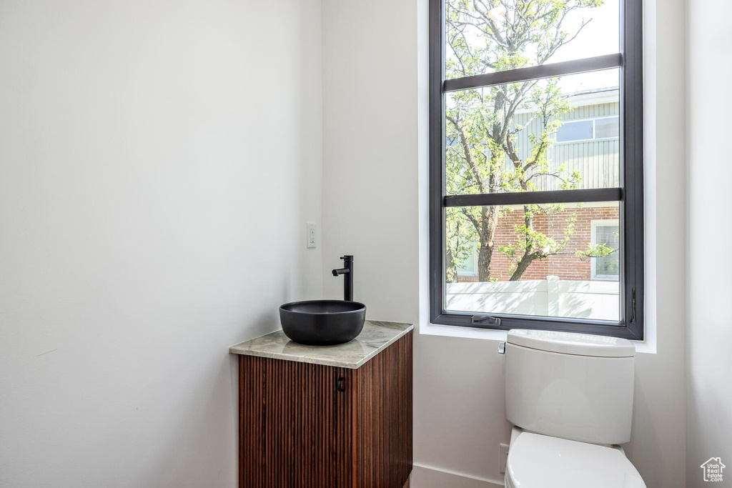 Bathroom featuring toilet and vanity