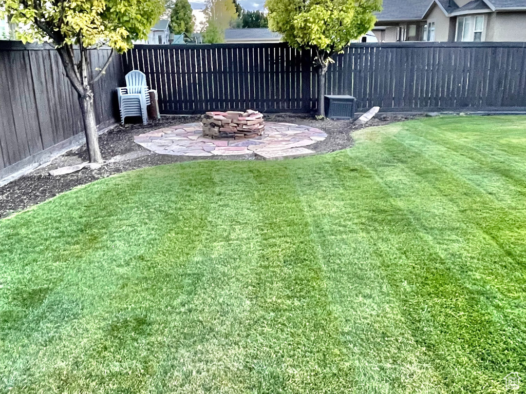 View of yard with a patio area