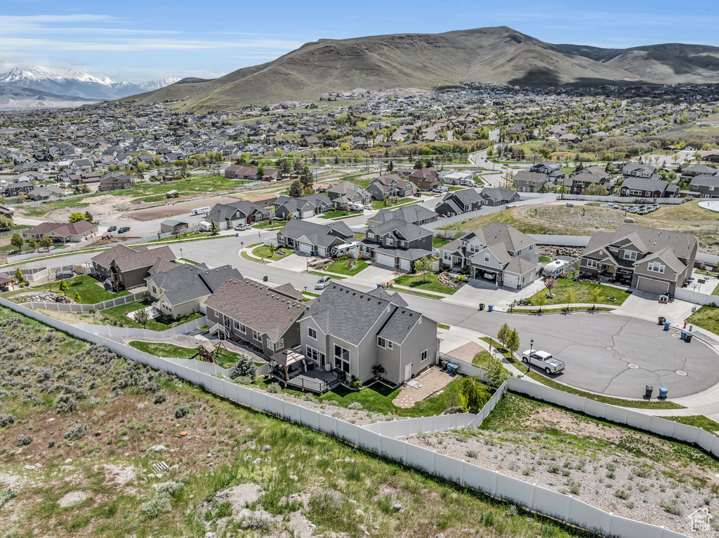 Birds eye view of property with a mountain view