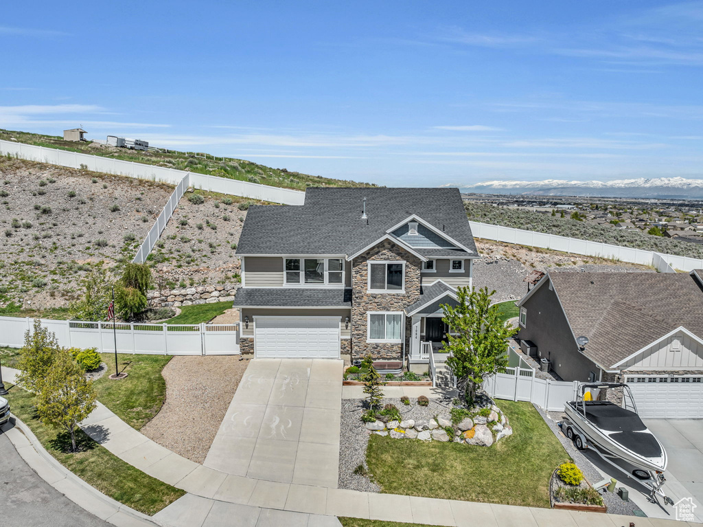 View of front of property with a front yard