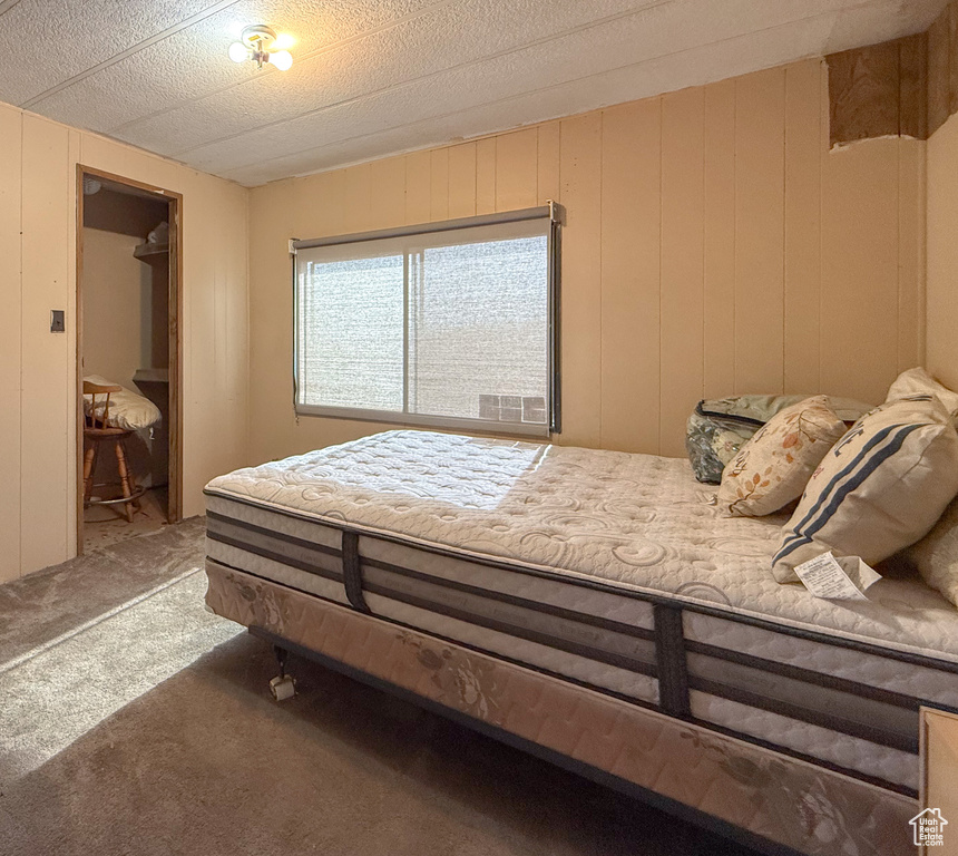 Bedroom featuring carpet