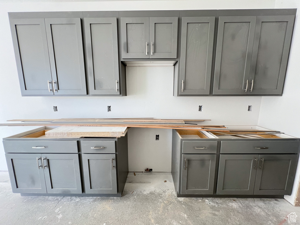 Kitchen featuring gray cabinets