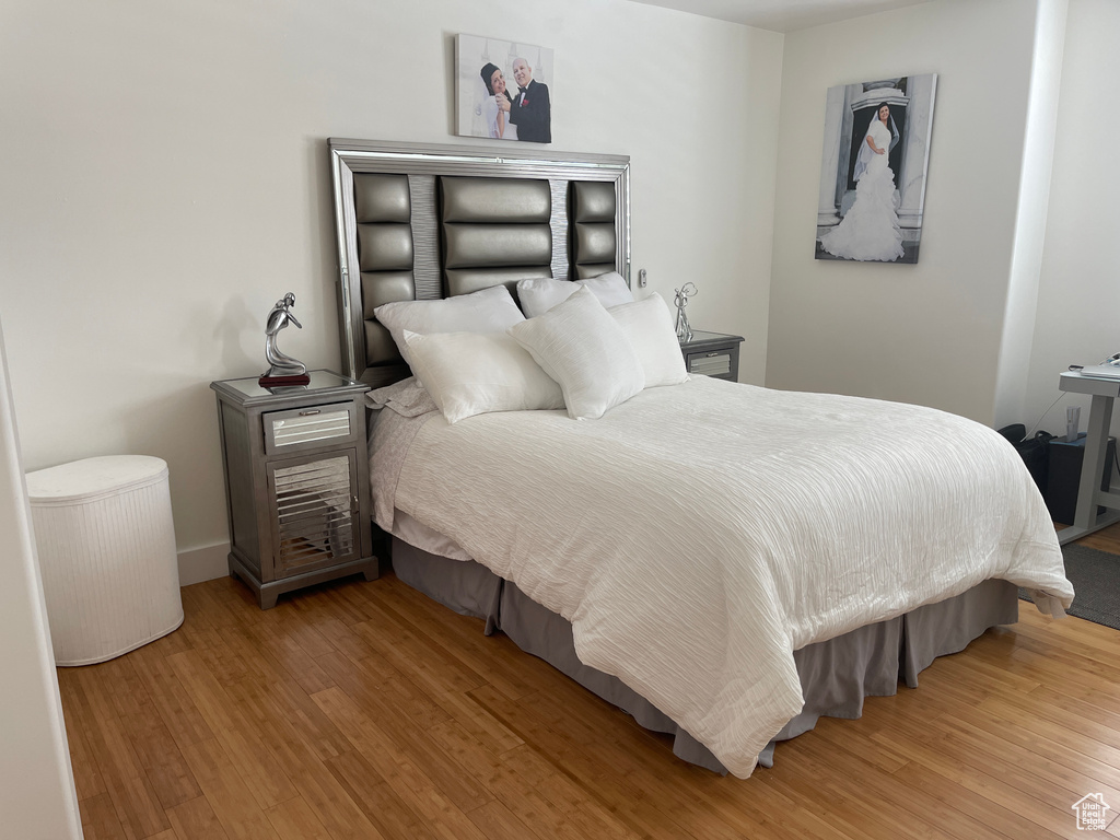 Bedroom featuring hardwood / wood-style flooring