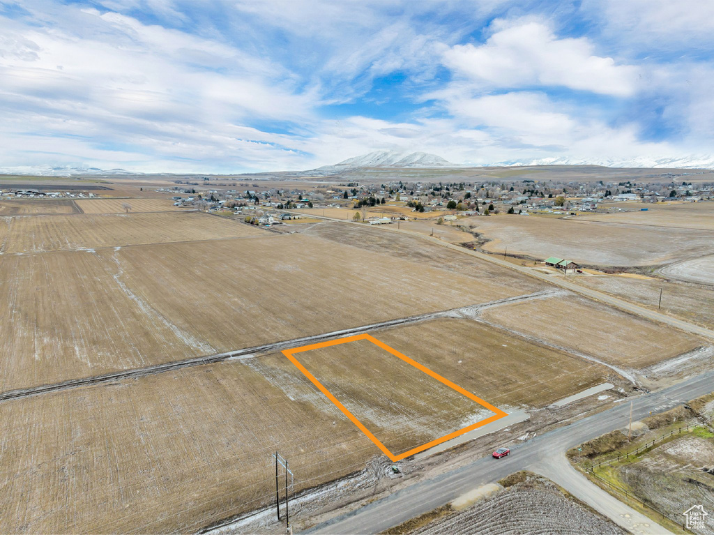 Drone / aerial view featuring a mountain view and a rural view