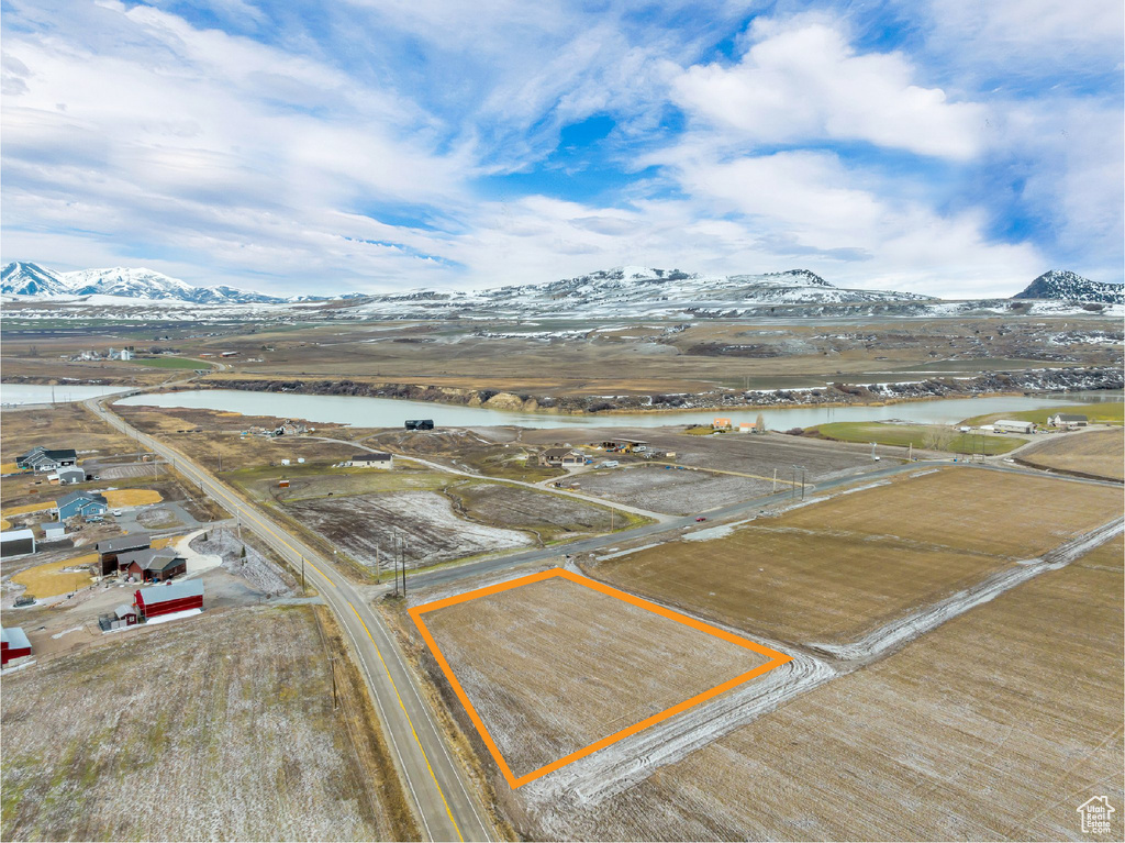 Aerial view with a water and mountain view