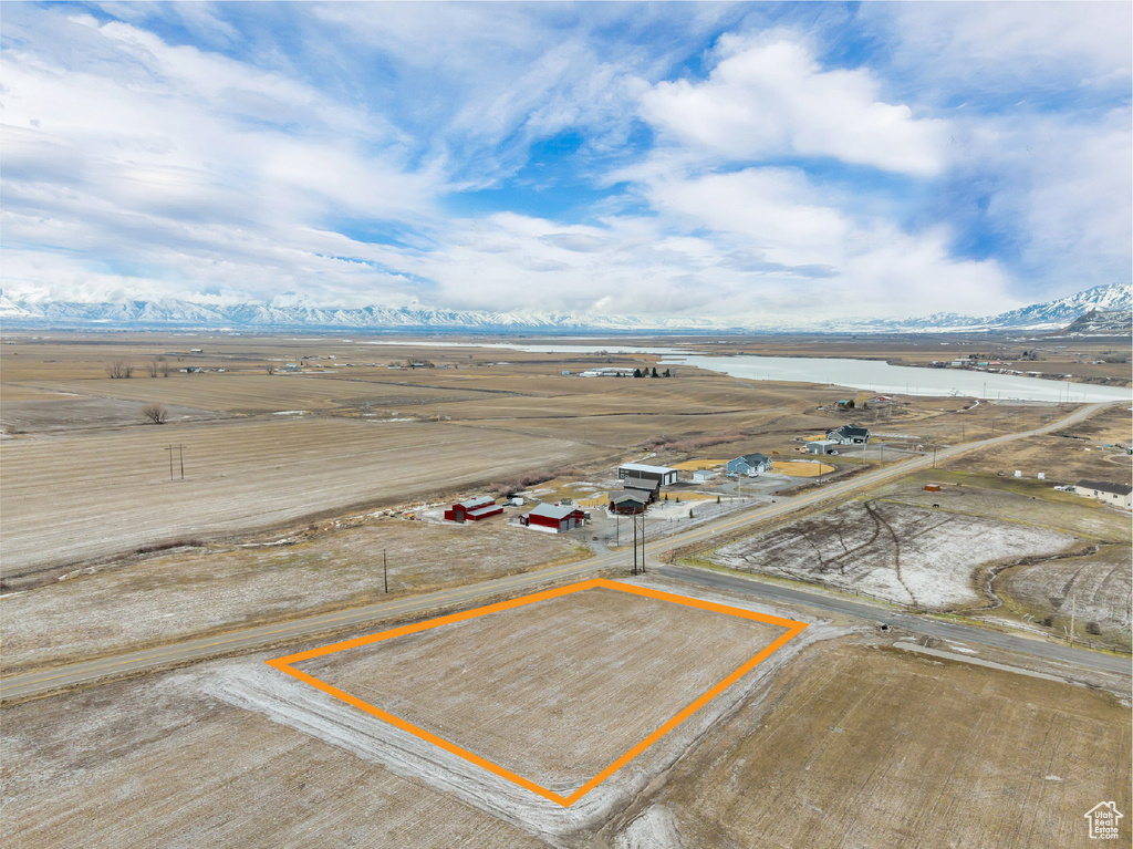 Birds eye view of property featuring a rural view and a water and mountain view