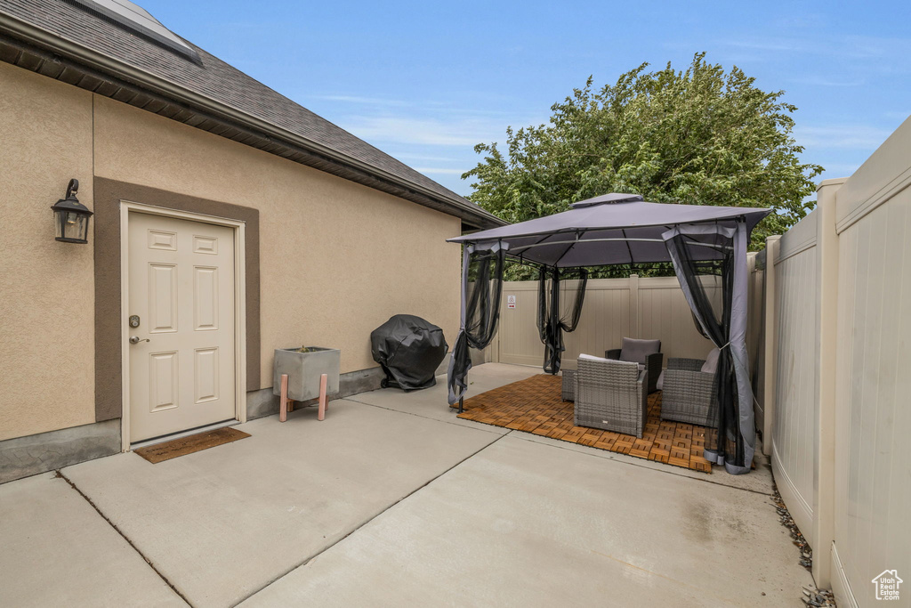 View of patio / terrace with grilling area and a gazebo