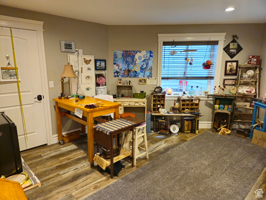 Office area featuring hardwood / wood-style flooring