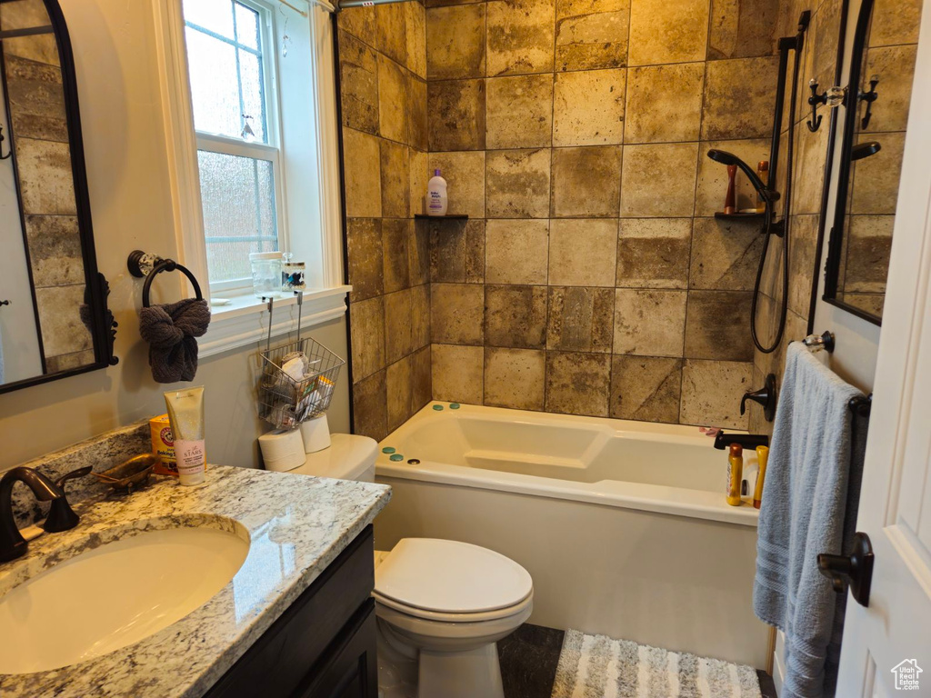 Bathroom with vanity and toilet