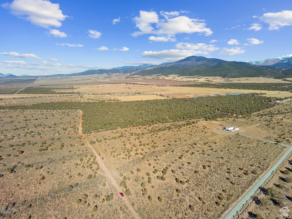 Aerial view featuring a rural view and a mountain view