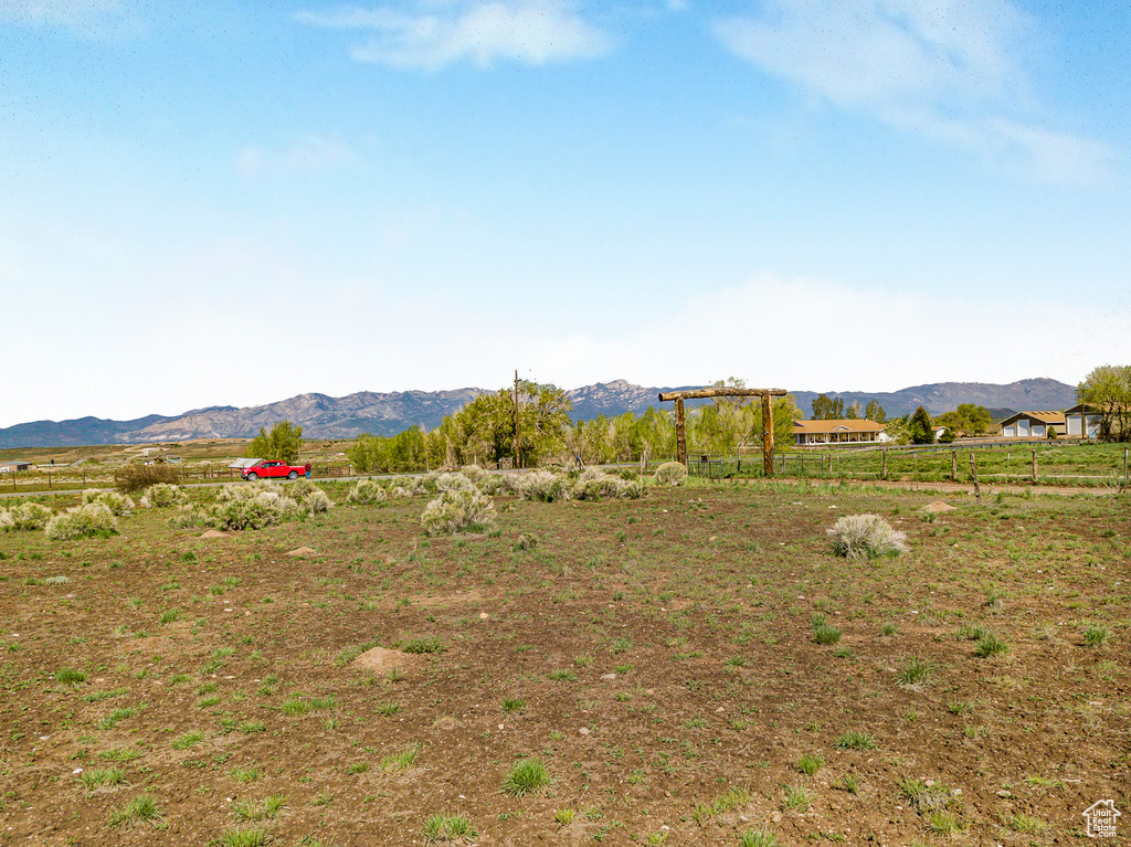 Property view of mountains featuring a rural view