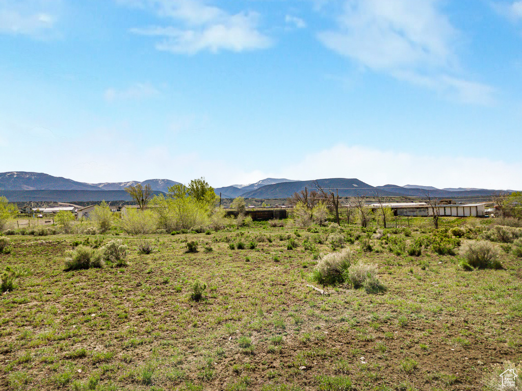 View of mountain feature with a rural view