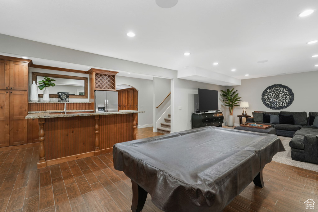 Rec room with billiards and dark wood-type flooring