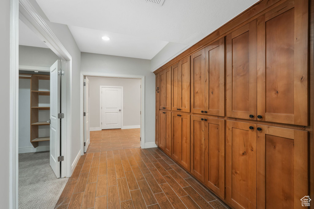 Hallway featuring hardwood / wood-style floors