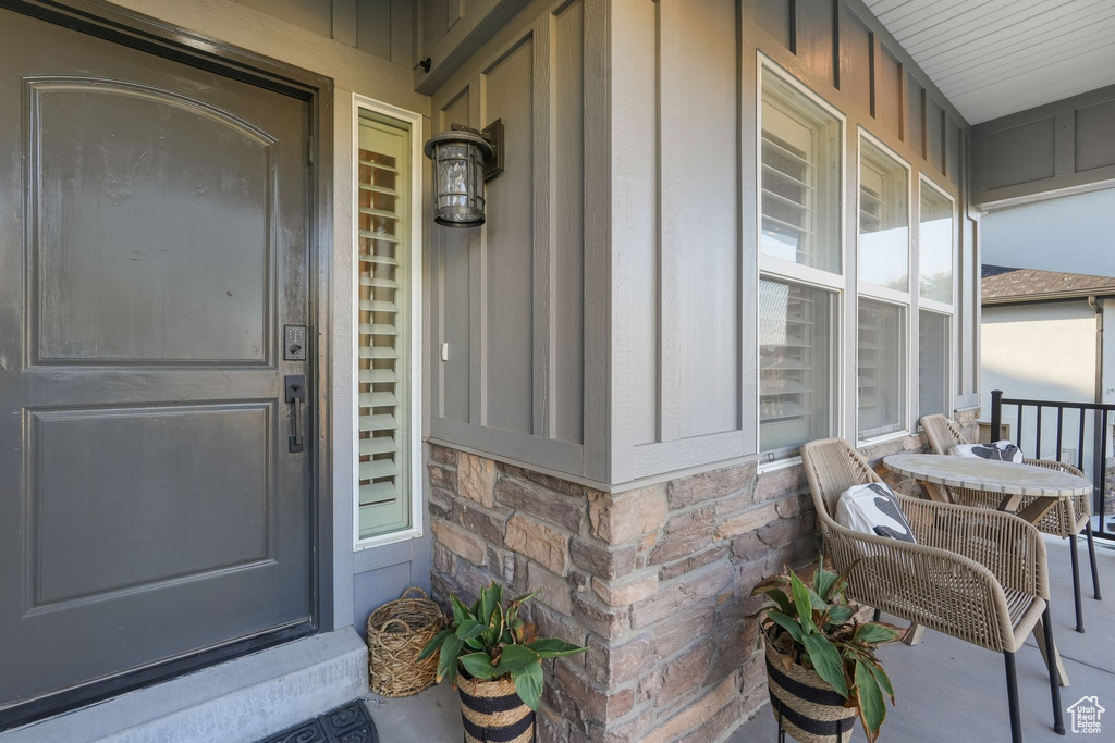 Property entrance with covered porch