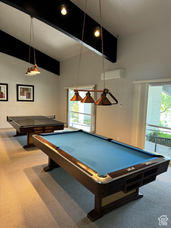 Playroom featuring a wall unit AC, beamed ceiling, a towering ceiling, carpet, and billiards