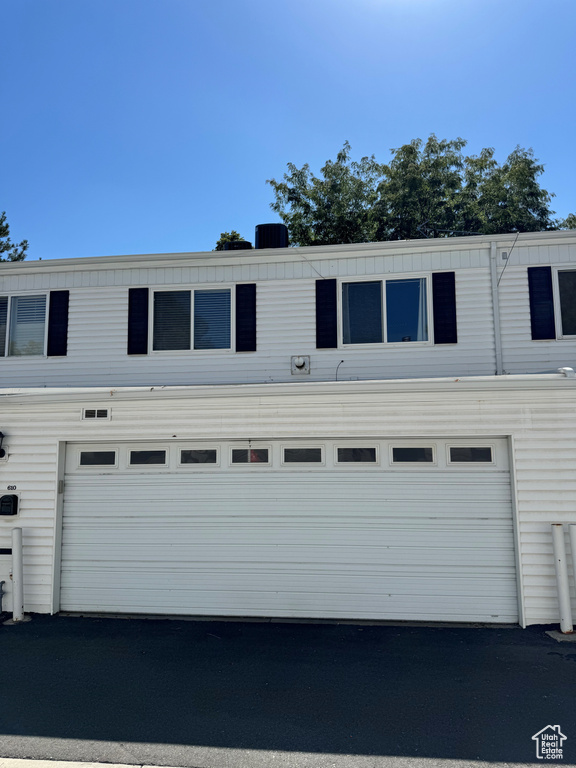 Exterior space with a garage