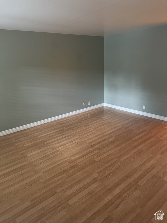 Spare room with light hardwood / wood-style flooring